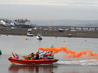 Santa swaps his sleigh for a lifeboat