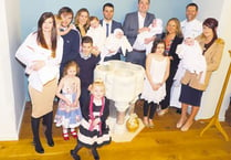 It’s a family affair as grandchildren make it an unusual triple christening