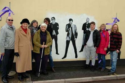 Street artist Mos restores Teignmouth's Muse mural