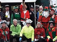 Cyclists still pedal into festive spirit