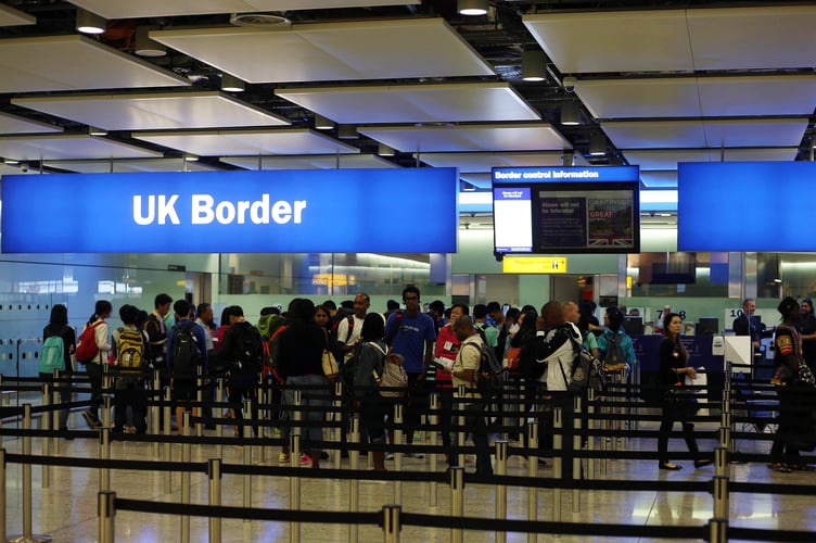 General view of passengers going through UK Border at Terminal 2 of Heathrow Airport. PRESS ASSOCIATION Photo. Picture date: Wednesday July 22, 2015. See PA story  . Photo credit should read: Steve Parsons/PA Wire