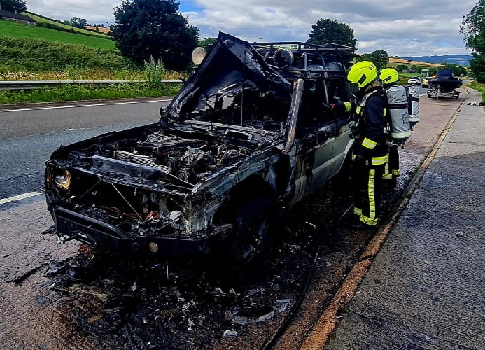 A spokesperson for Buckfastleigh Fire Station said: 'The quick thinking driver managed to un-hitch a boat the vehicle was towing meaning only the car was damaged.'
After they had finished battling the blaze, the crew took a few minutes to pick up rubbish discarded by drivers and ended with a whole black bin liner full from only 20 metres either side of the car. 
Picture: Buckfastleigh Fire Station
July 2022