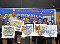 Pupils show off mosaics to art society donors