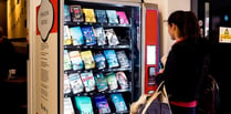 Penguin installs book vending machine at St David's Station in Exeter
