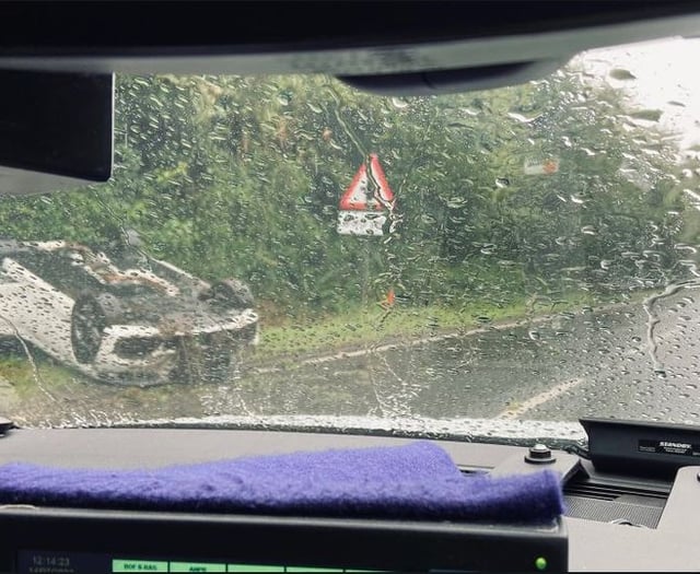 Overturned car on A38 causes long delays