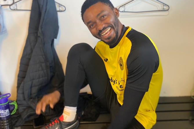 Nurse Ben Popoola in the changing rooms at Dawlish United FC 