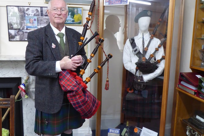 John Millin at Dawlish Museum with his father BNill's bagpipes 