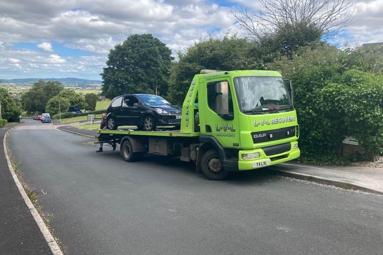 Abandoned car in Exminster is finally moved. Photo Alan Connett 