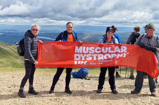 Liz Keenan and her team complete the Muscular Dystrophy UK challenge. 