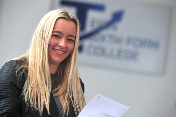 A-Level results day at Teign School, Kingsteignton. Alicia Linscott was delighted with her results - despite having to juggle competing internationally in BMX competitions and studying.
'The results were much  better than I expected,' she said.
However, the talented rider isn't heading on to university as she has secured an apprenticeship as an insurance broker.