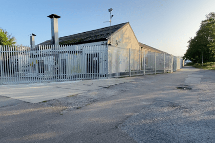 Security fencing erected around derelict Newton Abbot site