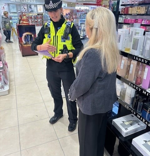 Police with Sharon Lobley from Austins department store 