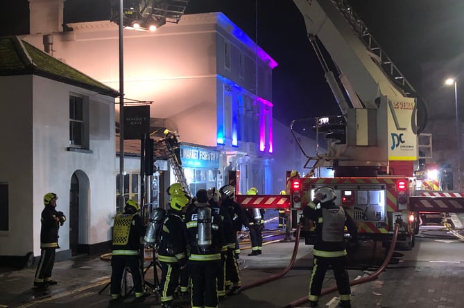 Firefighters tackling a blaze at Market Fish and Chips in Newton Abbot