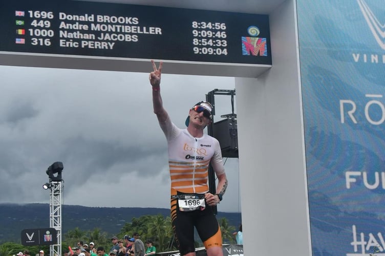 Donald Brooks crosses the finish line in Hawaii