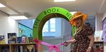 Author opens restocked school library