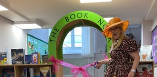 Author opens restocked school library