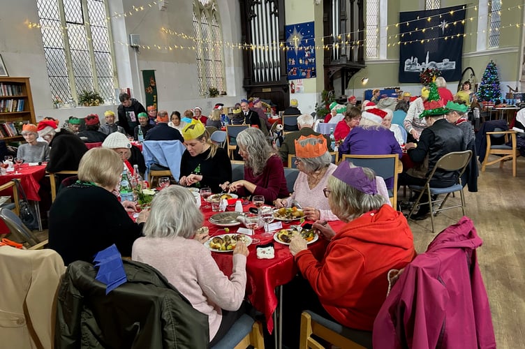 Diners enjoy Christmas lunch provided by the Strand Centre in Dawlish. 