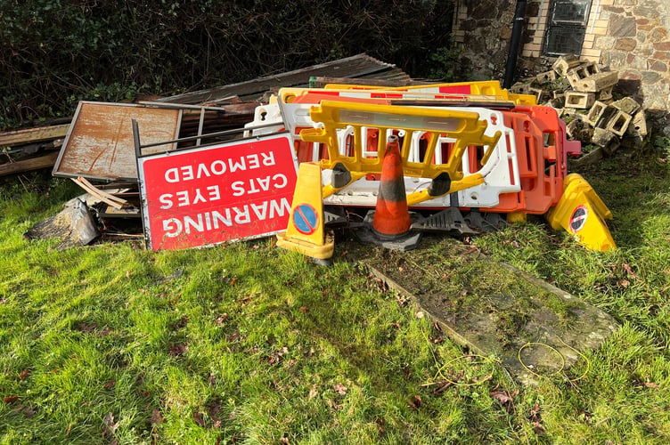 Road signs left in Bovey Tracey cemetery. Photo Gabi Morse 